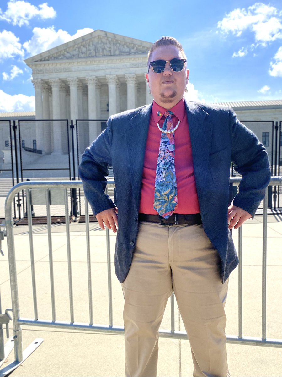 Power pose on the steps of the #SCOTUS post-transition! We’re here, we’re queer! We excel in all things, if you feel threatened by this, you are #weak. There is no “#transdebate”, there is only trans excellence! #pridemonth2022 #