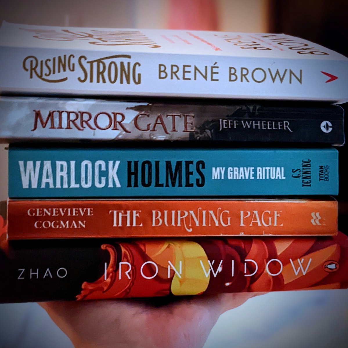 This is my stack of physical #currentreads for <a href="/Dessertathon/">Dessertathon</a>

Rising Strong: 12%: Cocoa Powder

Mirror Gate: 80%: Butter

Warlock Holmes: 31%: Sugar

Burning Page: 68%: Eggs

Iron Widow: 62%: Cinnamon