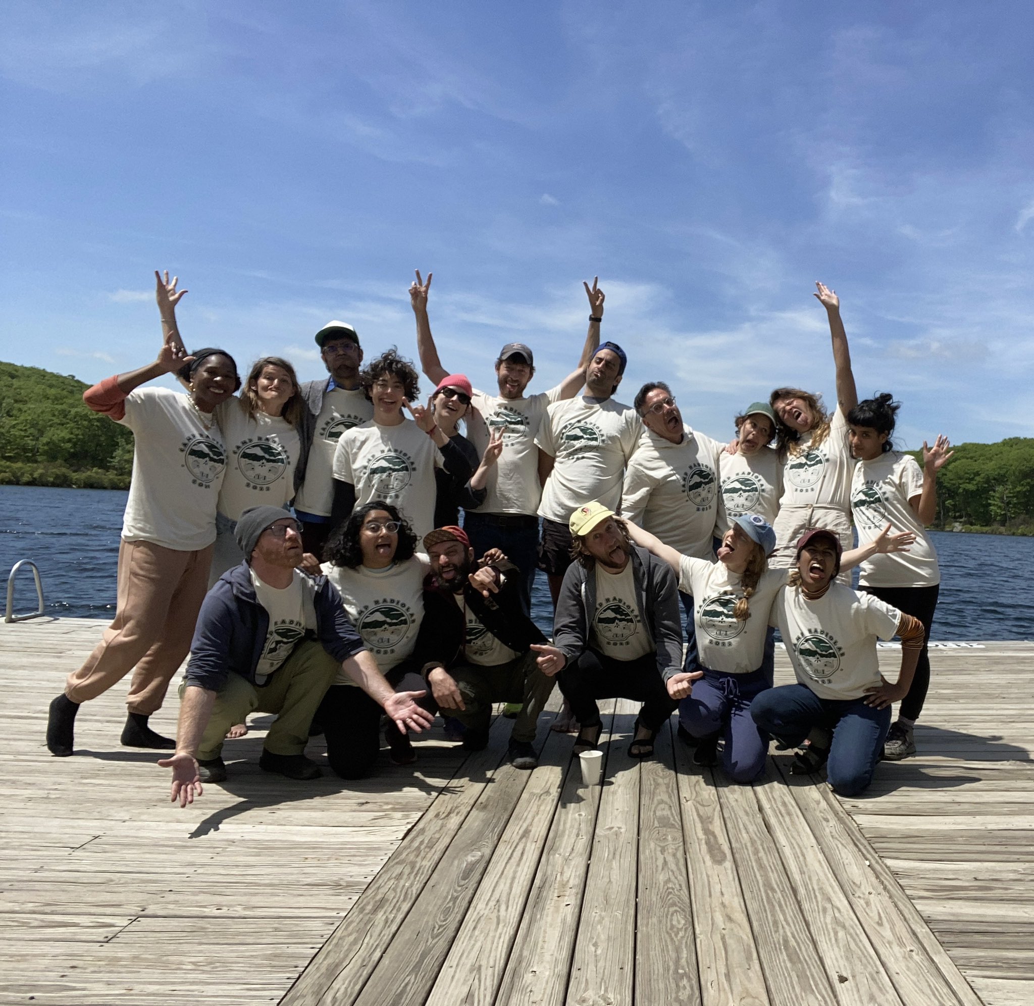 Radiolabs team makes goofy faces on a dock