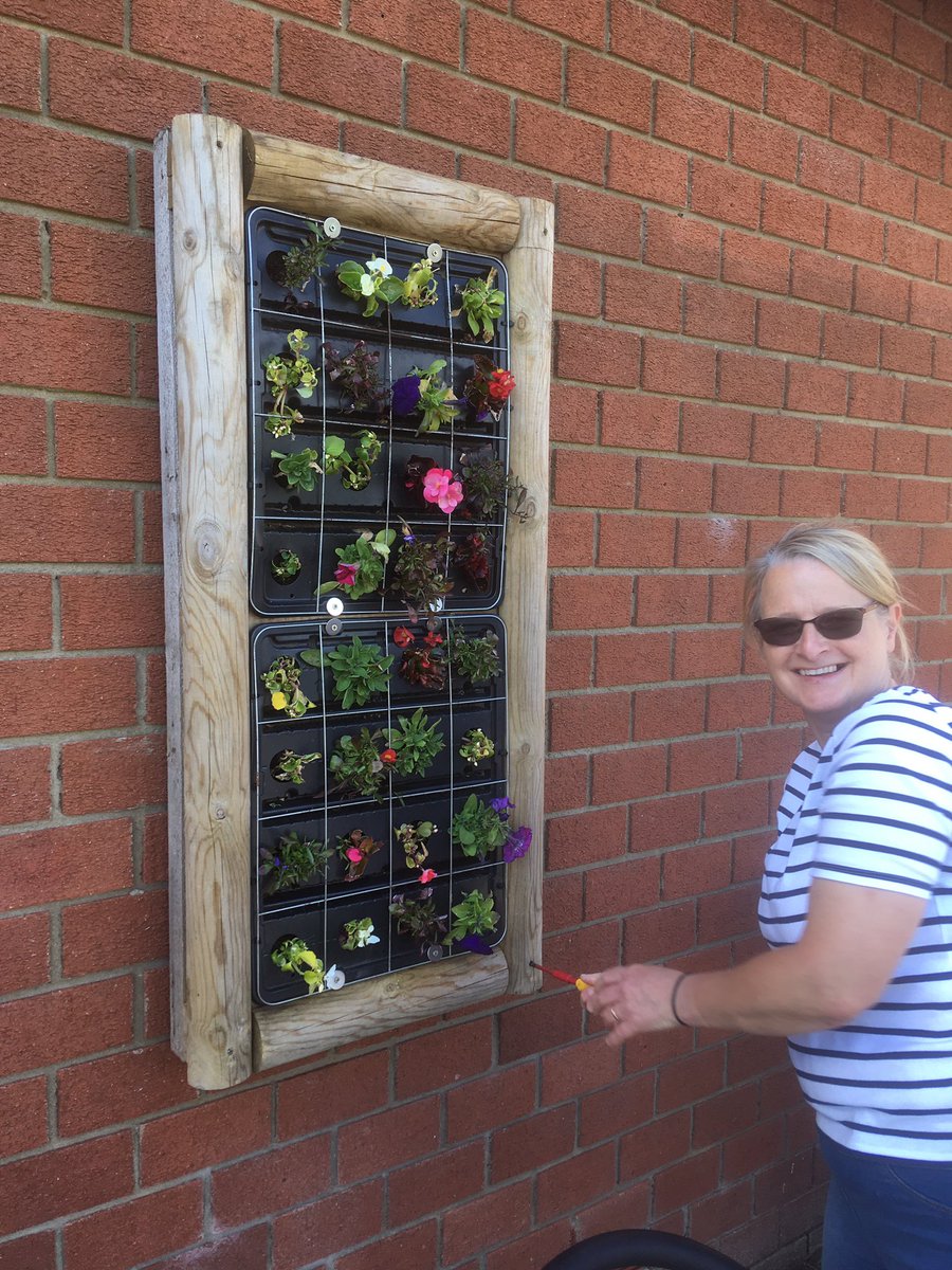 PaulaWarrener's tweet photo. @FourfieldsSc is now proudly showing off its living picture made by it gardening club. Thank you to my support team for getting out of bed on a Sunday morning to help me. Love you all. Now let’s watch it grow!👩🏼‍🌾💜@RHSSchools @YaxleyParish https://t.co/SEZk0a9Wzr