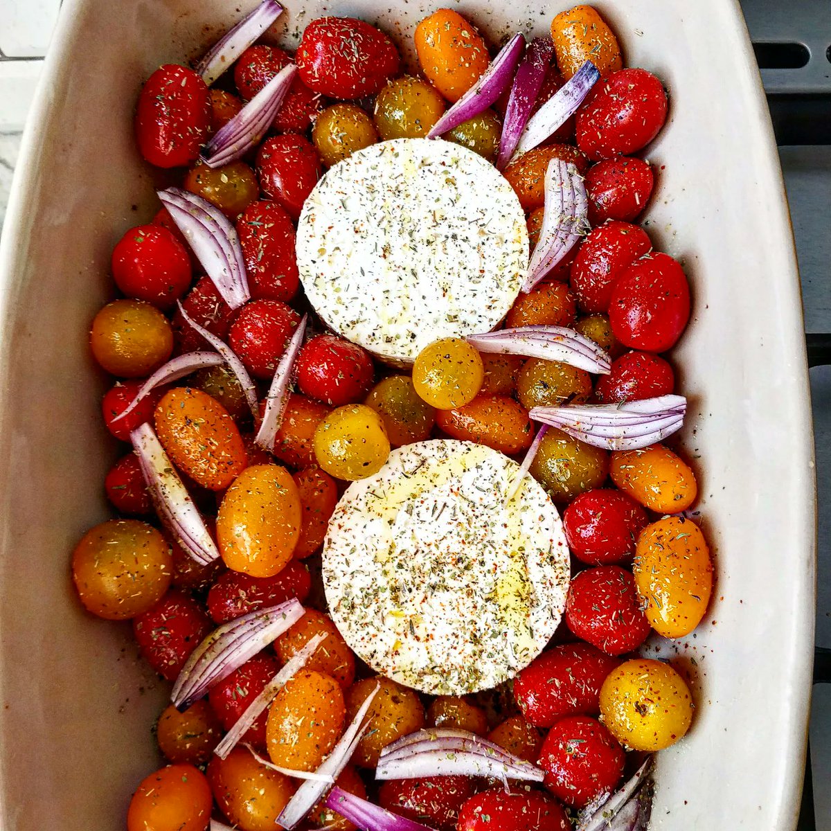 Borg_22's tweet photo. Oven dish with cherry tomatoes and feta cheese. Served with tricolore pasta. Yummy! 🍅😋 https://t.co/QhWtJQDj5B
