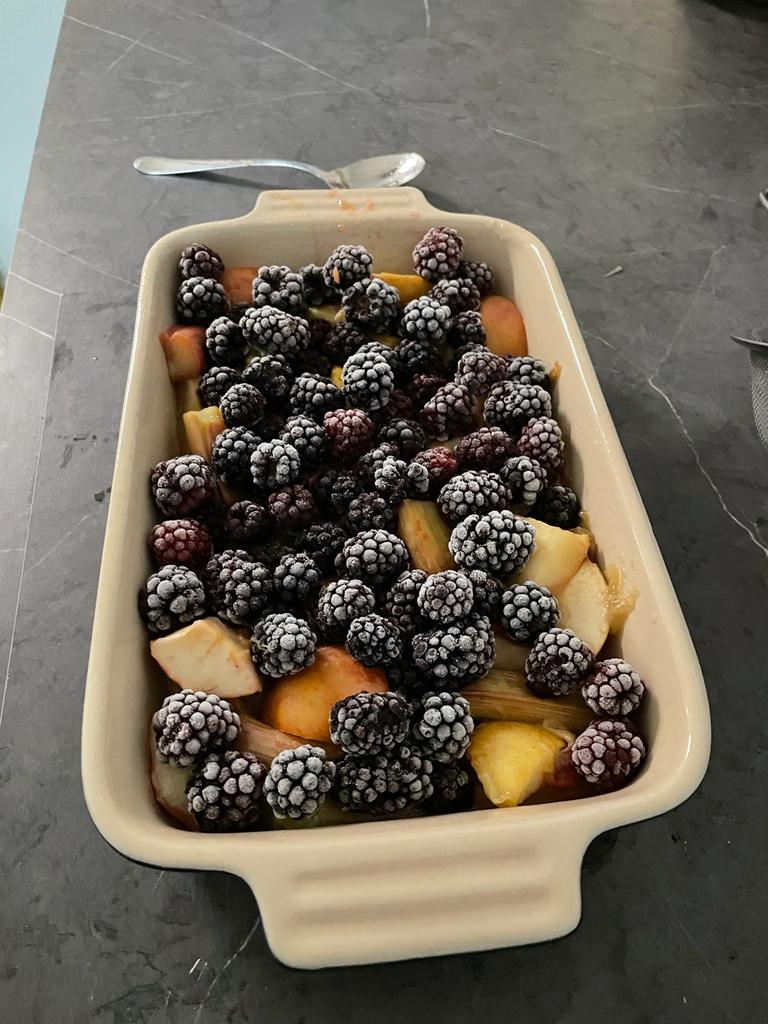 rogerdrags's tweet photo. Apple, Raspberry and Rhubarb Crumble, just made by Chef Ruby. The rhubarb is fresh from our garden, the raspberries are ours, picked and frozen last autumn, the apples were purchased today #chefruby #fiercefood #baking https://t.co/jYtHsBR6gj