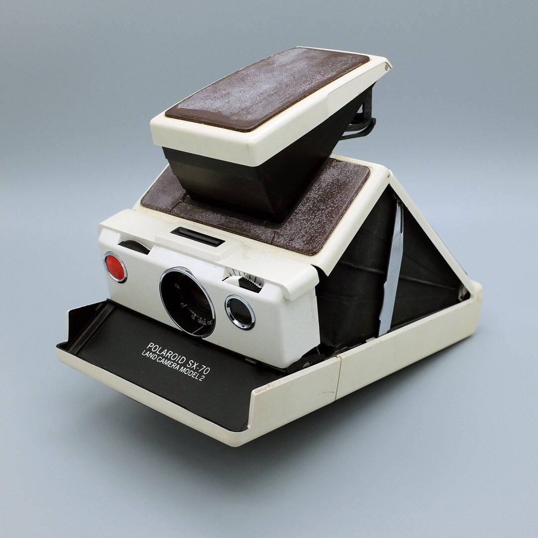 HadoLand's tweet photo. This weekend’s town wide garage sale started off with a fizzle with hardly a #camera to be seen and ended on a banger with not one, but three #polaroid #sx70’s to add to the #cameracollection . Regretted selling my old SX-70 years ago, so I’m looking forward to trying these out. https://t.co/65SWIbt5K8