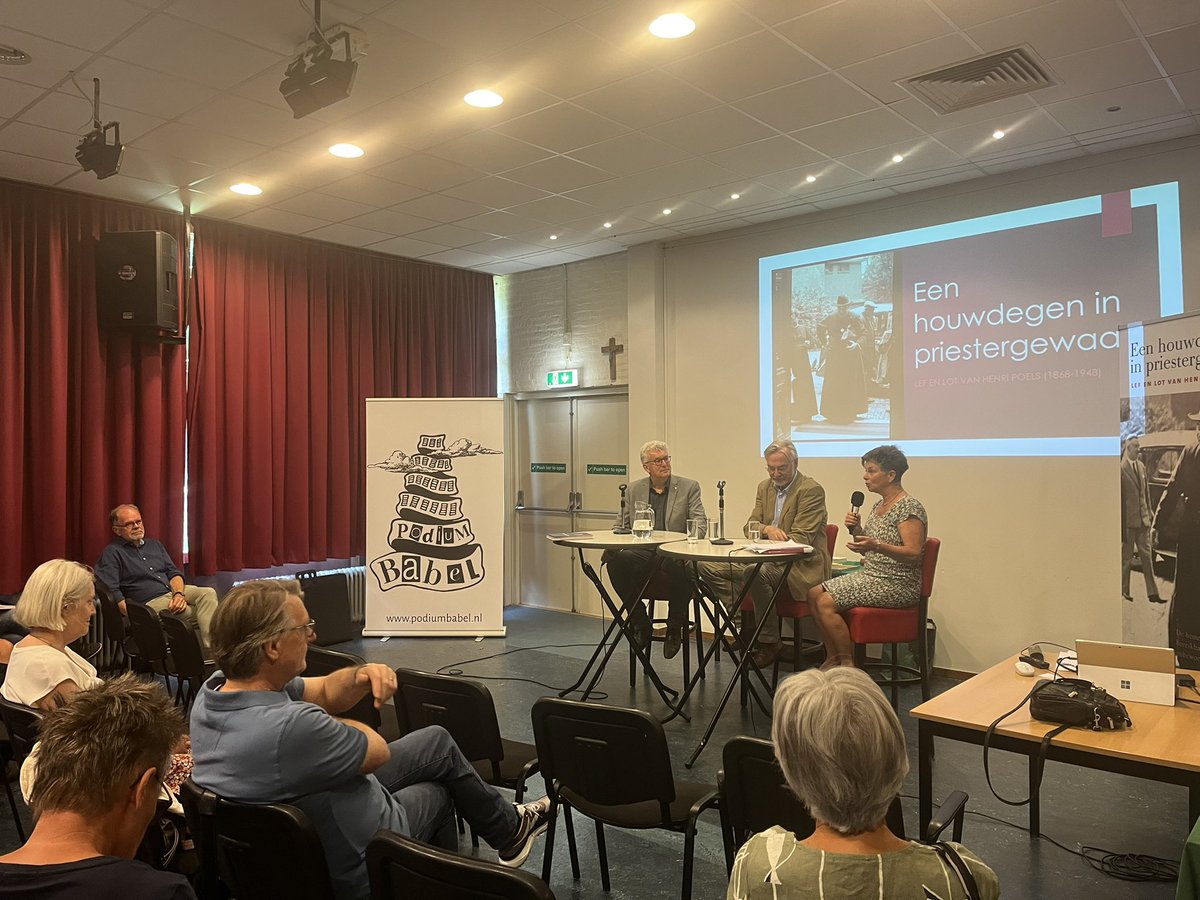 DijckHarry's tweet photo. Na Heerlen, Venray vandaag in Sittard: een praatje met een plaatje over ‘Een houwdegen in priestergewaad. Lef en lot van Henri Poels’. Samen met mede-auteur Koos Linders bij Podium Babel, met kritische interviewer/antropoloog Kitty Janssen (@DeDomijnen). #volkshuisvesting https://t.co/ot7wG9dGfx