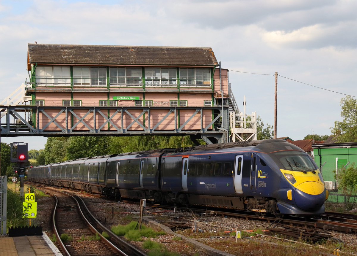 JosephB_05's tweet photo. Landed in Canterbury for a few days down in Kent. Not much time for trains but here’s a quick phot I grabbed of 395016 &amp; 395009 pulling into West with a service to St Pancras. Loving the signal box! #Canterbury #CanterburyWest #Class395 #Javelin https://t.co/duFF3i41Tf