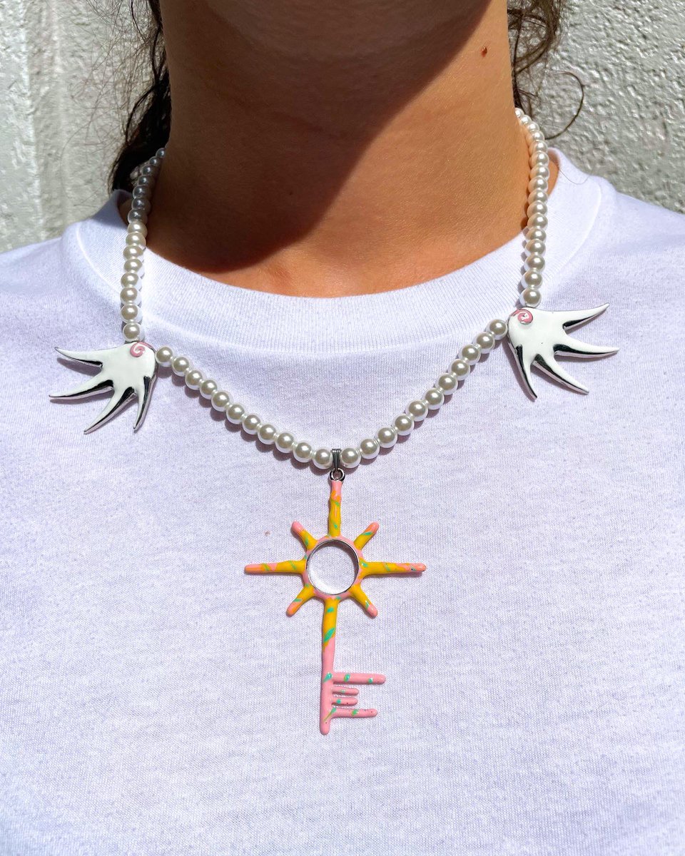 sageinutopia's tweet photo. i just released my first jewelry piece ever called, “Key to Utopia” made of hand sculpted &amp; hand painted 3D enamel. A key to unlock your greatness and wings to help you fly when you leap🔑🕊 these are available on my website now https://t.co/hBC42AKnGr https://t.co/4eQxjM5Mlp