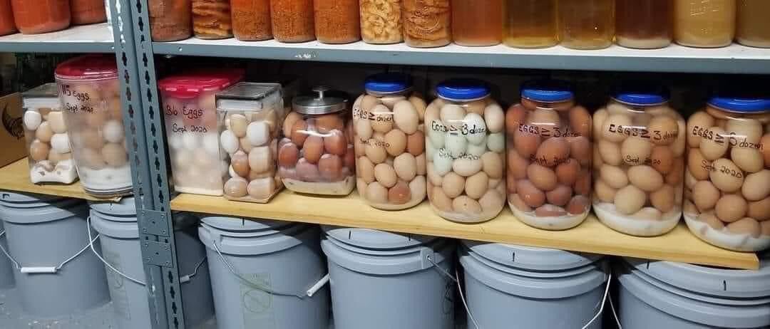 No. These are not pickled eggs. These are homegrown, unwashed eggs stored in lime water. The lime water fills in all the pores of the egg and encases them in a shell of "glass". Water glassed eggs can last stored at room temperature like this for up to 2 years. (1)