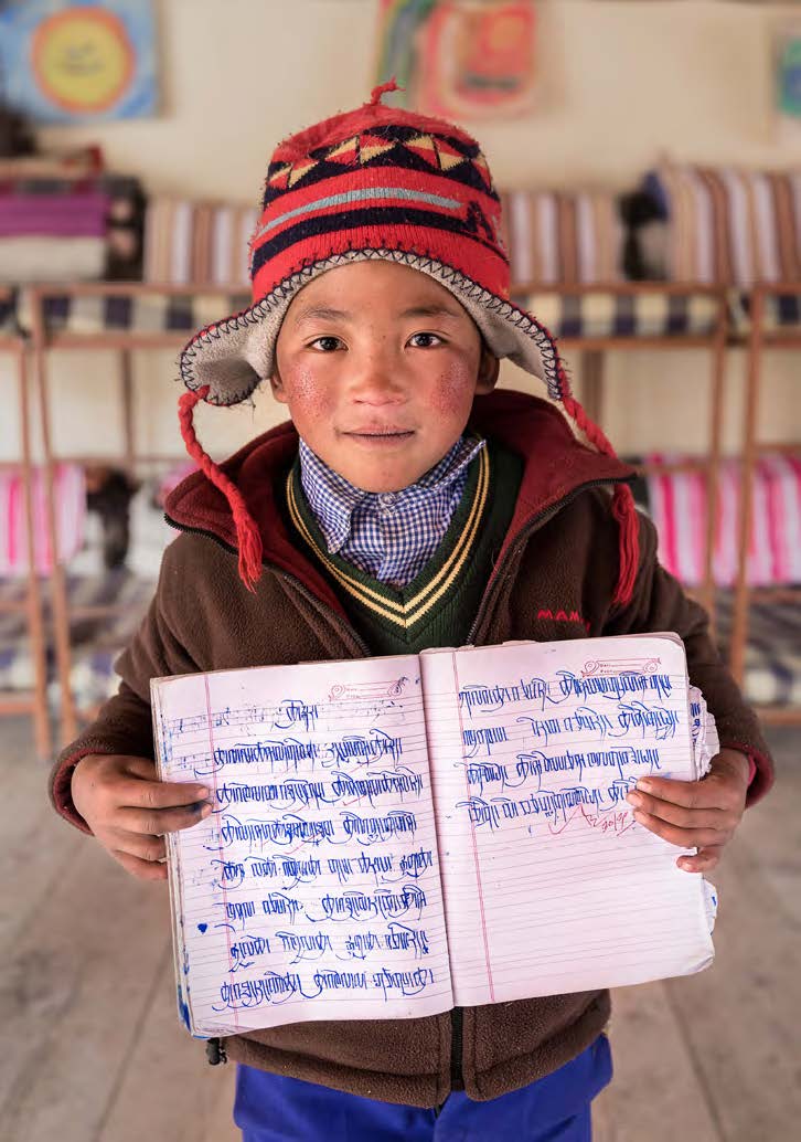 CultureTibet's tweet photo. A student from Tibetan Children's Village (TCV) with his #Tibetan notebook.
While #dragons are systematically wiping out Tibetan #culture , #language and #religion, it is crucial for Tibetans in #EXILE to keep it alive no matter what.
#childreninexile #hopenotout #Tibet https://t.co/r7trlzWRdg
