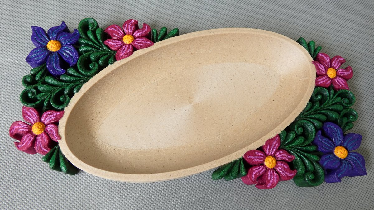 This wooden key/coin tray downloaded from <a href="/Cults3D/">Cults.</a> by Asgar33Junior is designed for a CNC. I don't have one, but I do have <a href="/3DTomorrow/">3DTomorrow</a> Wood filament, and after making the model solid to print, I think it came out pretty good.