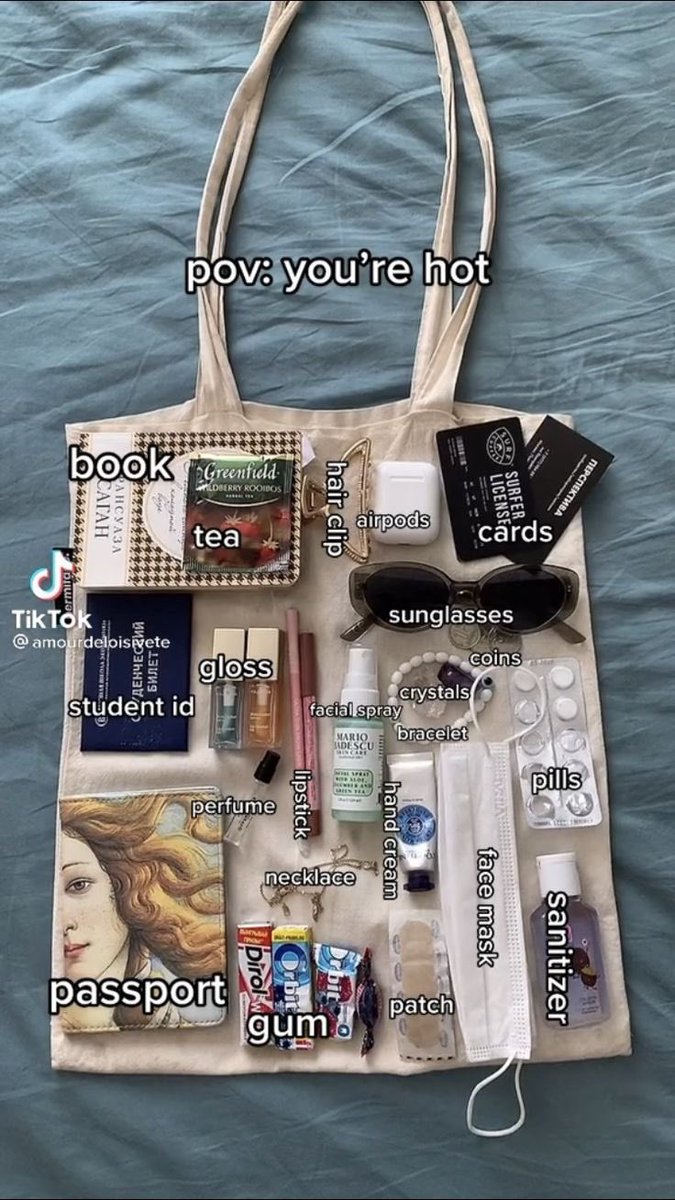 A guide inside a hot girl’s tote bag.