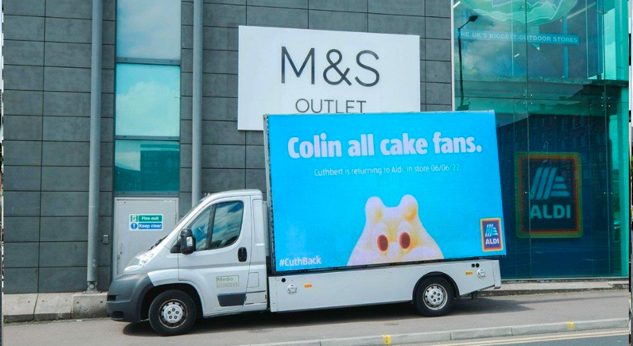 RapportWW's tweet image. After a brief spell away from the shelves, Cuthbert the Caterpillar is back! To mark his return, @AldiUK sent a fleet of Ad Vans to spread the word – directly outside M&amp;amp;S stores!

We think there&apos;s only one winner in this latest installment of Henry vs Cuthbert...😋 #CuthBack