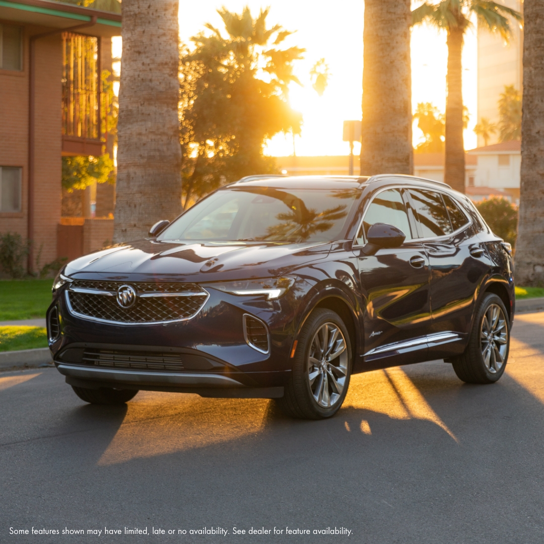 Buick's tweet image. This sunset is the perfect excuse to take a drive. #BuickEnvision