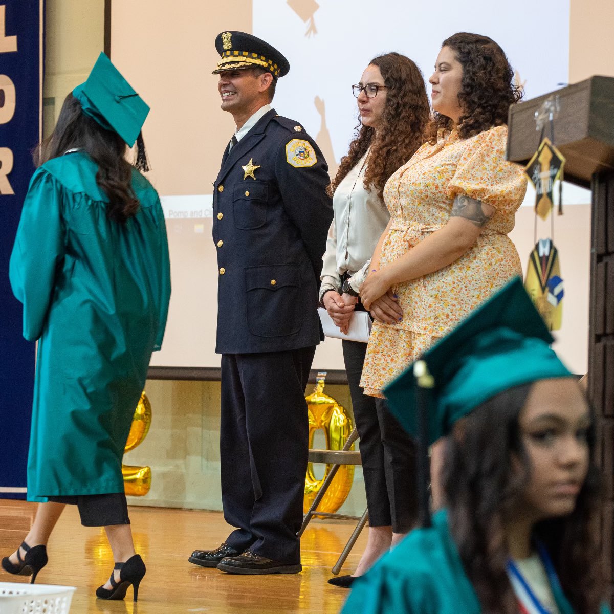 Chicago_Police's tweet photo. Commander Ralph Cruz delivers the keynote address to 8th-grade graduates at his alma mater, Douglas Taylor Elementary School @TaylorES_CPS in Chicago’s East Side neighborhood. #CPDMediaCar 

📸:CPD Graphic Arts https://t.co/QVRwPVl0Dg