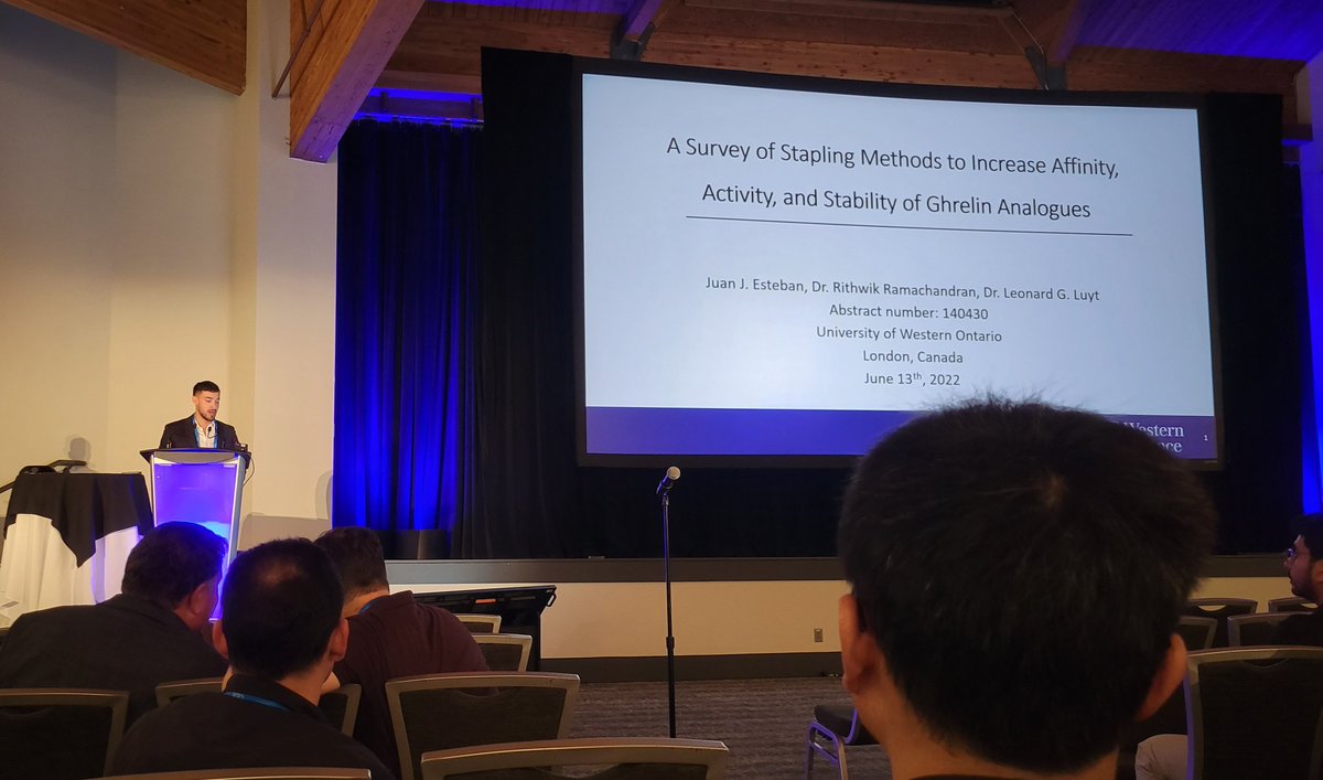 LuytGroup's tweet photo. Stapled #ghrelin story now on the big screen at #Peptides2022, as told by @jestcon97. @westernuchem https://t.co/k7mAHaCCE5