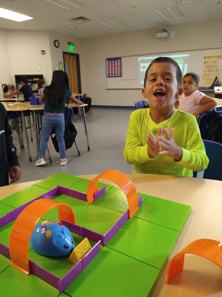 GreenJulieL's tweet photo. Our STEP into Kindergarten Ss are having so much FUN learning the basics of coding with interactive robot mice! Problem solving and critical thinking skills are a must for the mouse to catch the cheese! The chase is on! #TitleISupport #malits @IRCSchools @kls_krista #STEP2022 https://t.co/prF4SnkZyj