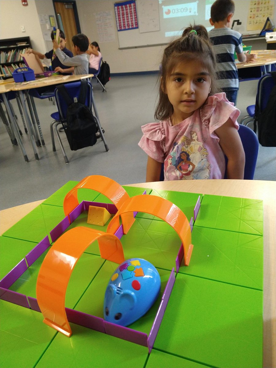 GreenJulieL's tweet photo. Our STEP into Kindergarten Ss are having so much FUN learning the basics of coding with interactive robot mice! Problem solving and critical thinking skills are a must for the mouse to catch the cheese! The chase is on! #TitleISupport #malits @IRCSchools @kls_krista #STEP2022 https://t.co/prF4SnkZyj