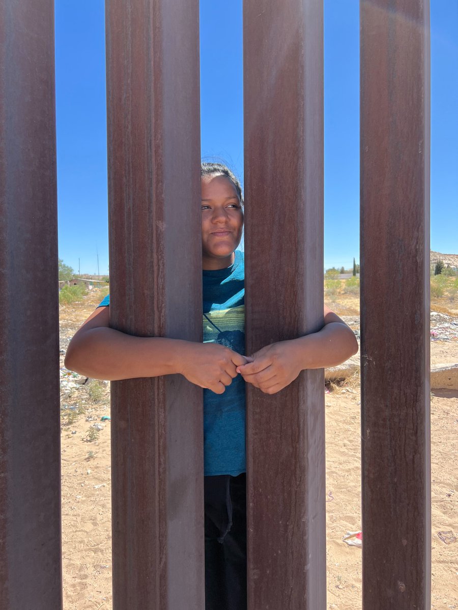 Wrapping her arms around the $15 billion border wall built by Trump, a woman in Anapra, Mexico, gazes into the United States.

#MercyForImmigrants #MercyForJustice