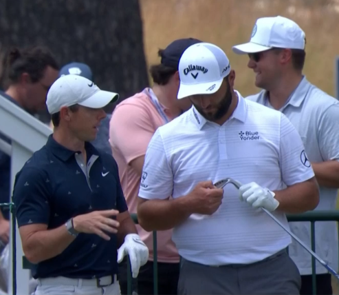 Optical illusion or is Rahm that much bigger than Rory? #USOpen