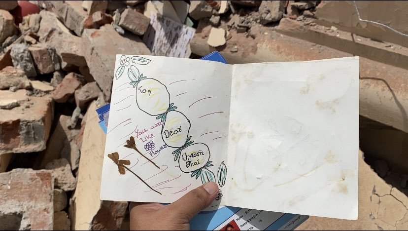Benarasiyaa's tweet photo. Academic report cards from class 1 -12, a handmade greeting card to a brother, membership receipts book and book titled “book thief” were among the things trapped in the debris of demolished house of Javed Mohammed in Kareli area in Prayagraj. 

Ground report soon on @TheQuint https://t.co/AxR5DTZQWk