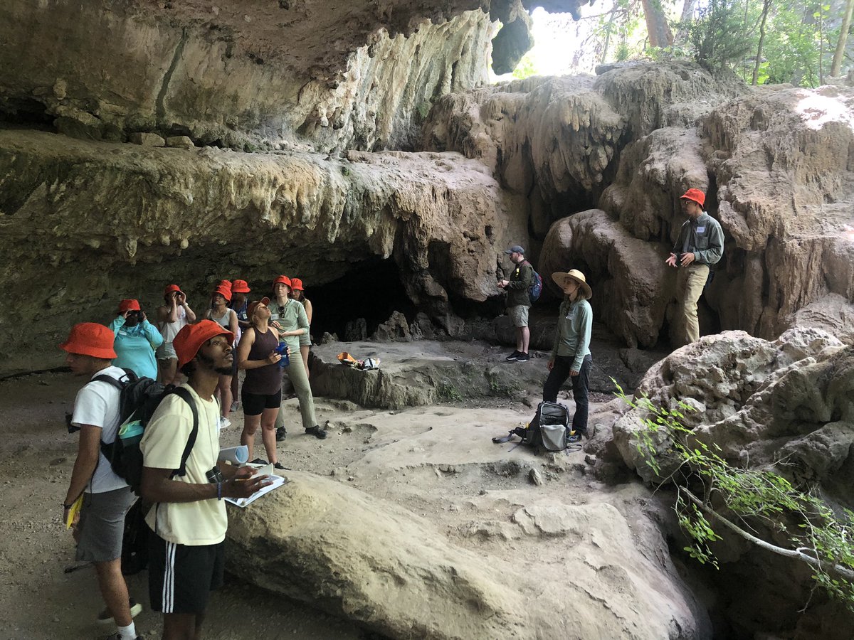 TDgravel's tweet photo. Fun day: visiting a collapsed cave in the Cow Creek Fm (limestone) by the Pedernales River in central Texas with students from RTX program @txgeosciences @GeoFORCETexas https://t.co/taqRBLSlCG