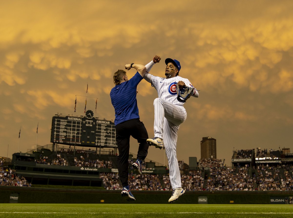 After the rains… #Cubs center fielder Christopher Morel warms up to face the San Diego Padres as the sun sets Monday at Wrigley Field.