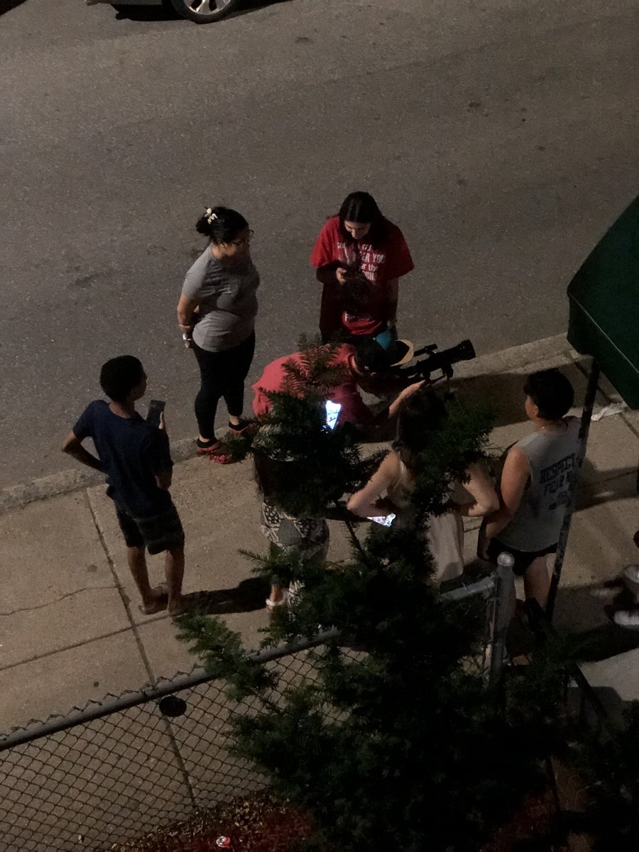 nickylibs's tweet photo. It’s a great night to look up at the moon! 

After 2 yrs of not popping up, this impromptu @bostonpopscope enticed even the most die-hard #celticsnation fans

Look up tonight if you need a breather from the nba cc @chicagoshea 

#popscope #nbafinals #strawberrymoon #astronomy https://t.co/ald9roo5ht