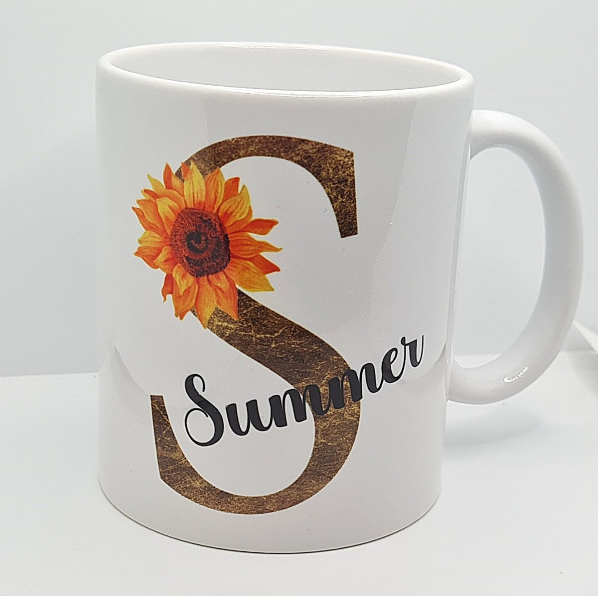 simplysarah72's tweet image. Sunflower Initial and Name Personalised Mug #MugGift #PersonalisedMug #NameMug #InitialMug #SunflowerMug