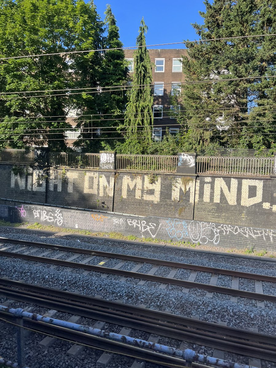 Adam1Austin's tweet image. Iconic graffiti on the run in to Euston from Birmingham. ‘Night on my mind’….been there forever and a day.