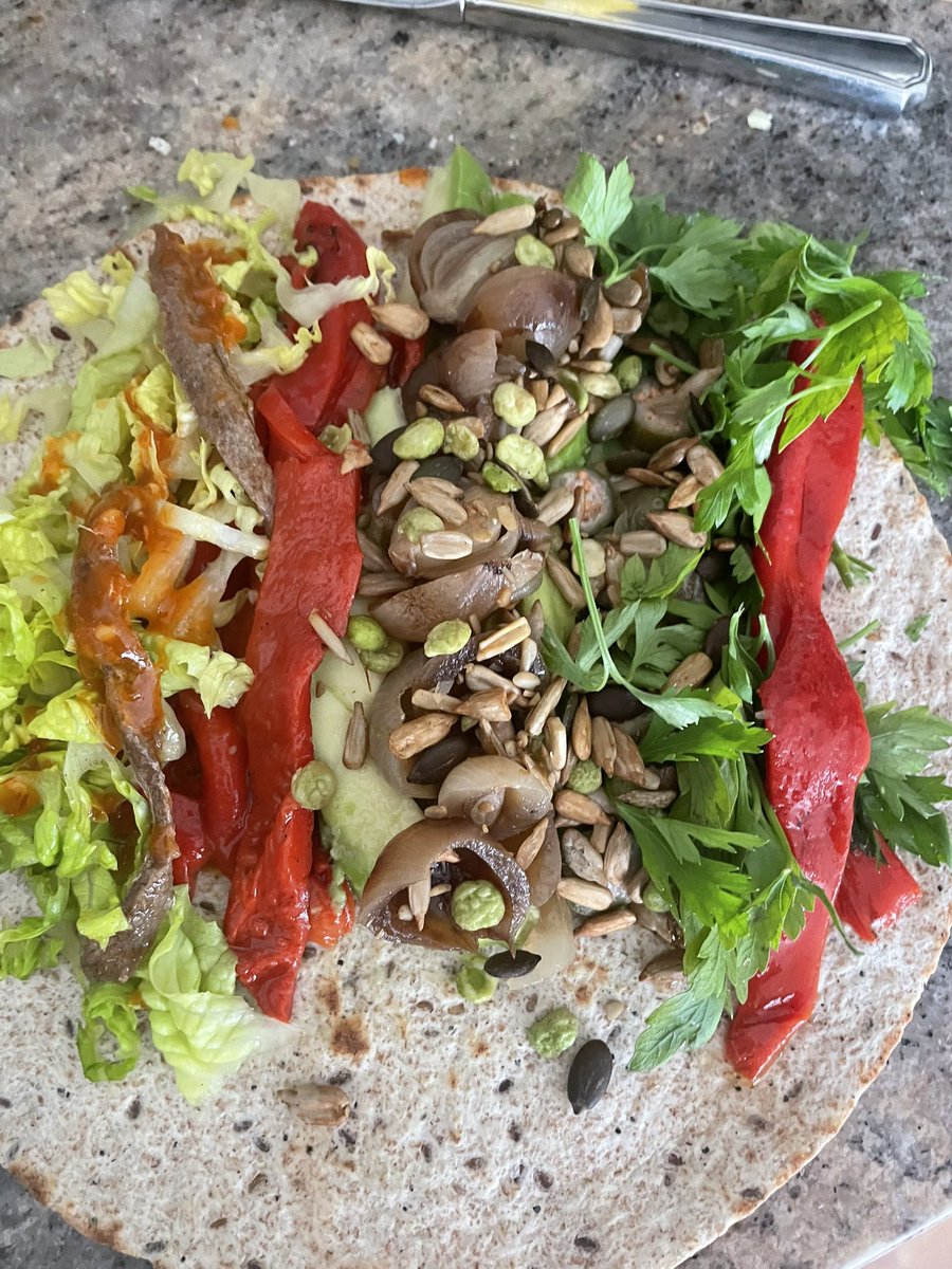 joemuggs's tweet photo. Went out on a limb with this salty spicy boi but it worked: avocado, peppers, caperberries, balsamic onions, quite a few chilli anchovies, lettuce, parsley, encona, tamari toasted seeds #wrapgame https://t.co/4tmXvn6C2I