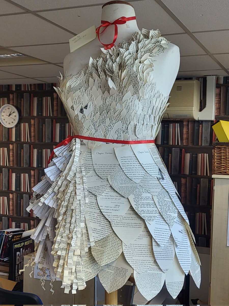Book dress designed by very talented Y11 student Devon. She's been working on this since World Book Day! Now proudly on display 👏 #proudtobeNOA #librarytwitter
