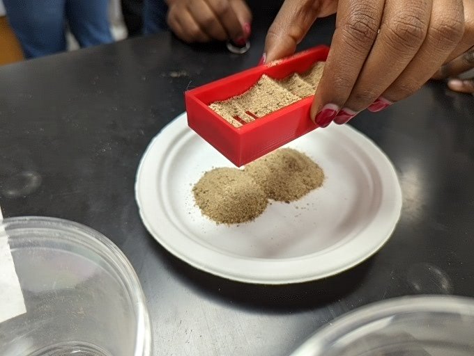 jim_deane's tweet photo. Students in @quantumforall Camp Day 2 learn about particle and wave behavior. Wide spaced slits produce more distinct separated piles. Next: comparing to diffracted laser beams. #iteachphysics https://t.co/FQ3ExbSAtg