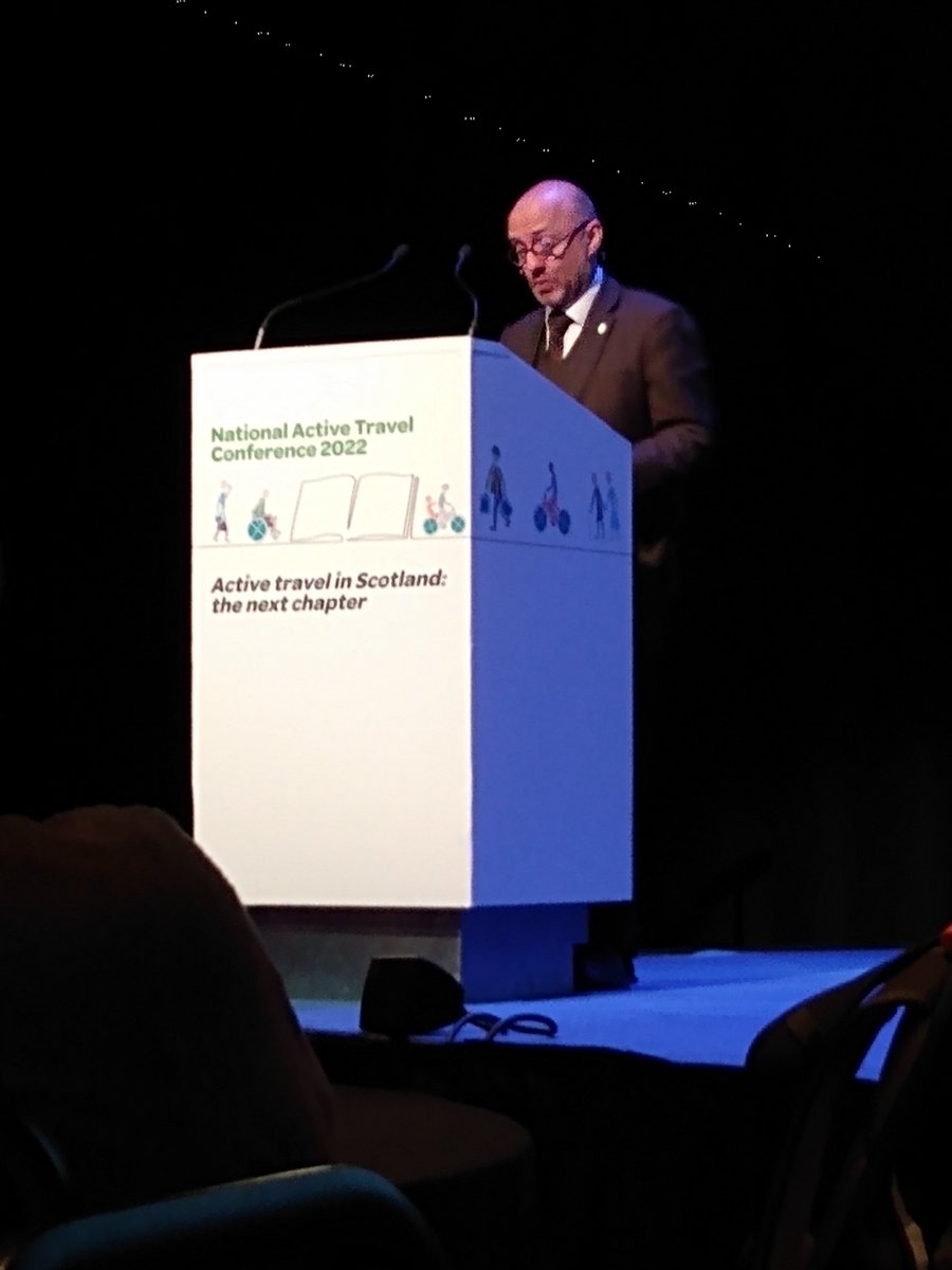 JimDensham's tweet photo. Minister @patrickharvie addresses #activescot22. Says 'we need to be bolder' on active travel. 'there's a huge amount to do'. https://t.co/hgGxXKRiE5