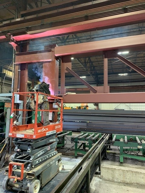 Coopersteelusa's tweet photo. Talk about teamwork! Our self-perform team recently installed this jack truss within the walls of our Shelbyville shop. this new addition allows both of our bays to transfer the larger and longer materials that our projects require. #BuildStrongStandStrong https://t.co/rBMR3xwaYa