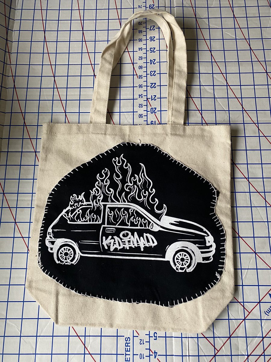 Kdimnds's tweet photo. Flannel + riot tote bag https://t.co/wfZ3wgu02F