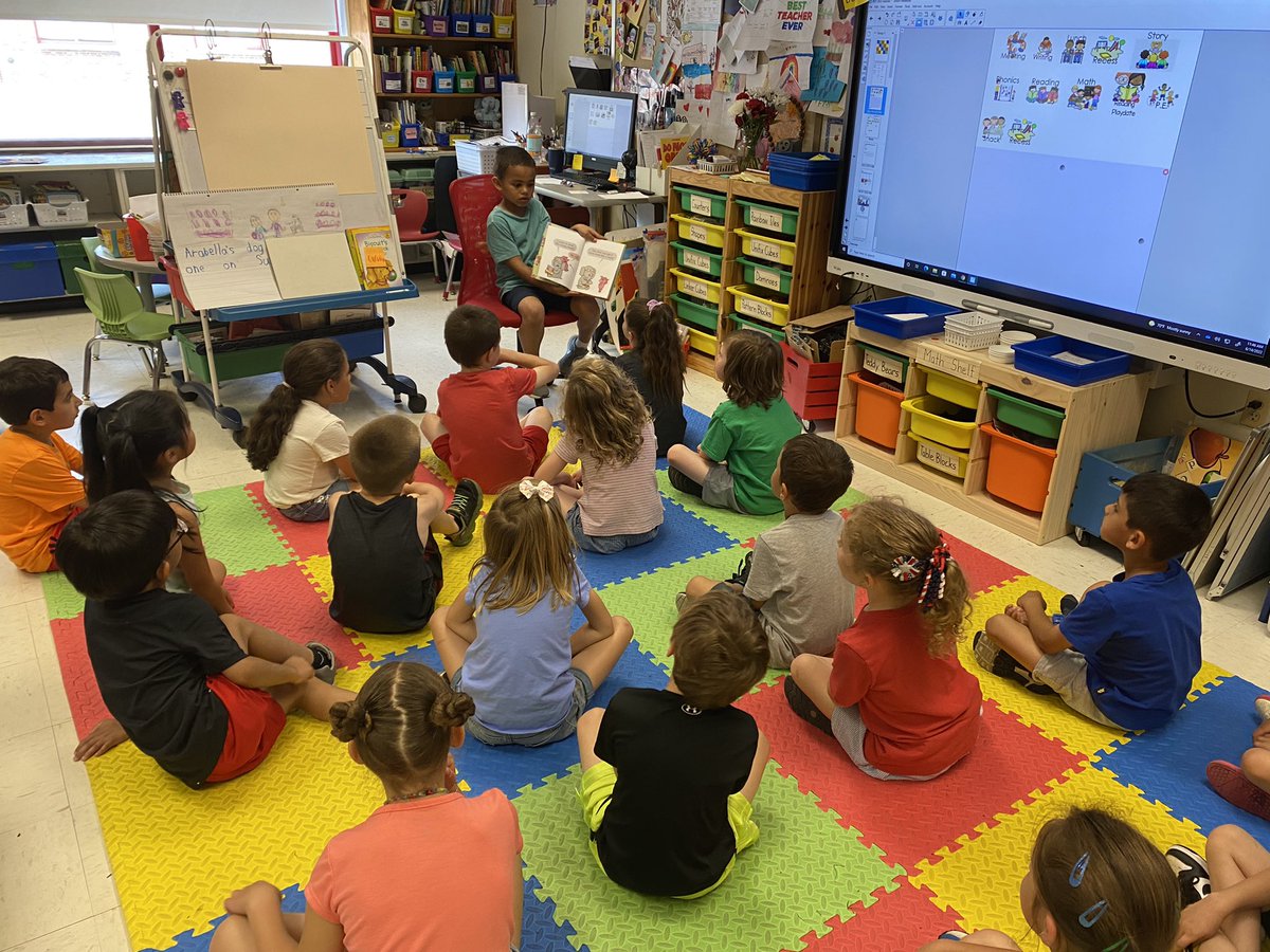 More students reading to the class