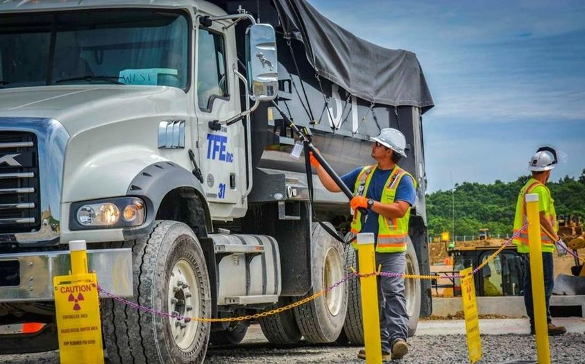 EMcleanup's tweet photo. 🚛 Waste placement continues at EM's Portsmouth Site.
Below, radiation-protection personnel survey a haul truck prior to its release from Interim Transfer Ramp 2 at the On-Site Waste Disposal Facility.
Learn more about Portsmouth waste disposal at https://t.co/v35MH9Q0l3. #PPPO https://t.co/bUzqyPHlYM