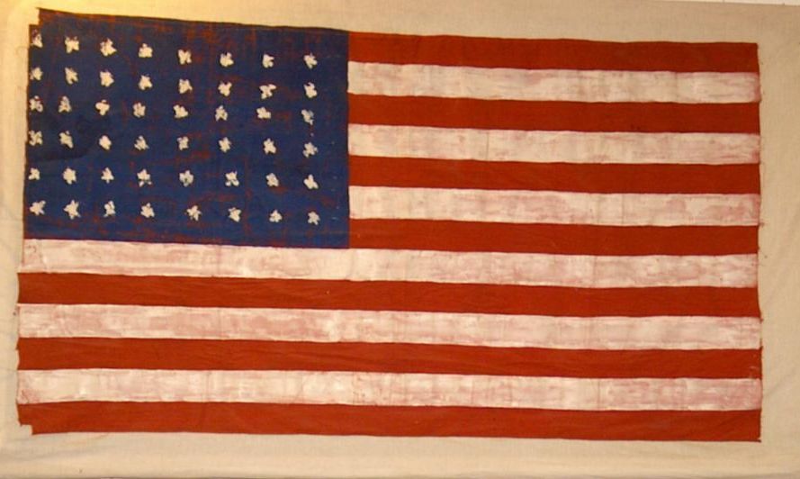 HolocaustNM's tweet photo. On Flag Day, the New Mexico Holocaust Museum calls attention to one of our most prized artifacts, the Flossenbürg Flag. It was created at the end of WWII by prisoners at Flossenbürg concentration camp in Germany. 

https://t.co/YqoxxJWFbe https://t.co/ll1yZcnL0a