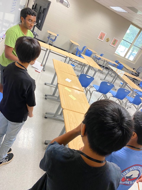 JaneWHerndon's tweet photo. Learning to code by first navigating through a maze and writing directions! Guests @johnson_mcs and student specialist Pranav are joining us at camp this week for some fun with coding! #mcslearn #MadisonESL https://t.co/QjZVY19Wws