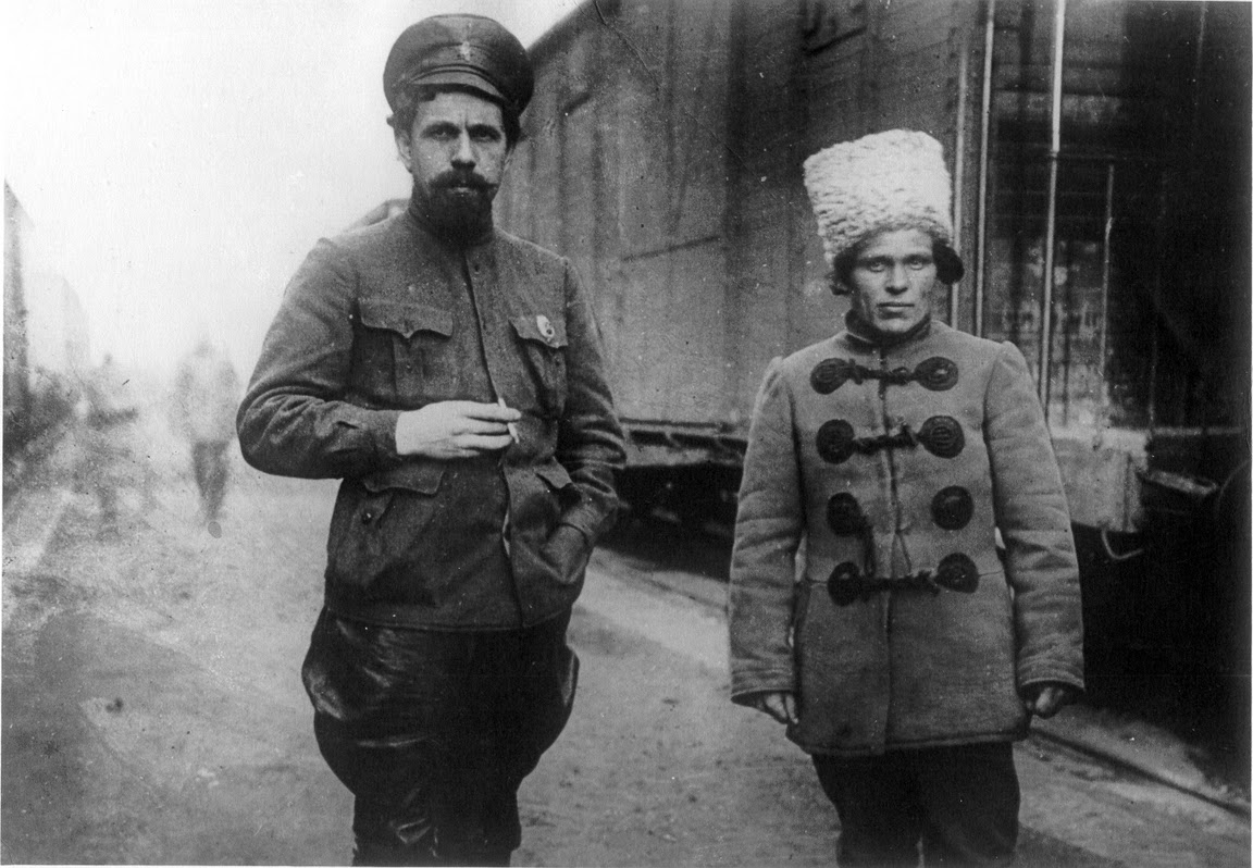 Bolshevik commander Pavel Dybenko and Anarchist leader Nestor Makhno after seizing the city of Mariupol from the Russian army, March 1919.