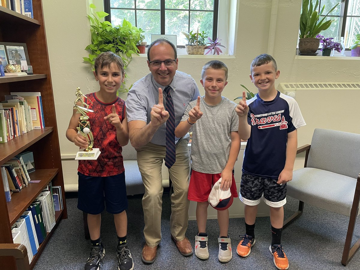 Markey, Sean, and Eddie stopped by my office to show me their trophy.  Their baseball team won the league championship! These guys are number one champions and number one for sportsmanship!