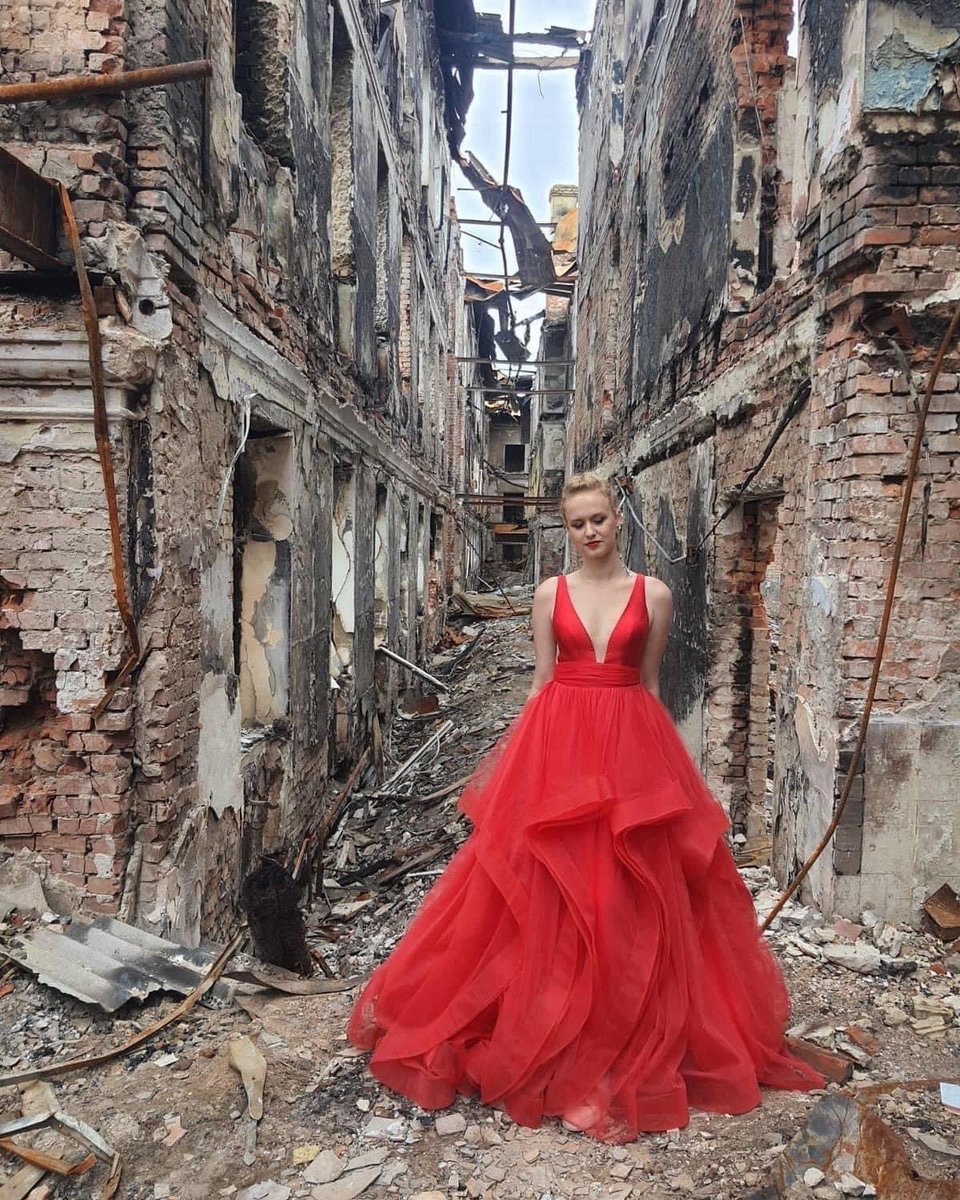barbarayoder's tweet image. An amazing picture, a Ukrainian high school senior standing in her graduation dress, celebrating life in the midst of the war rubble! The power of the Blood. The power of inner resolve!
