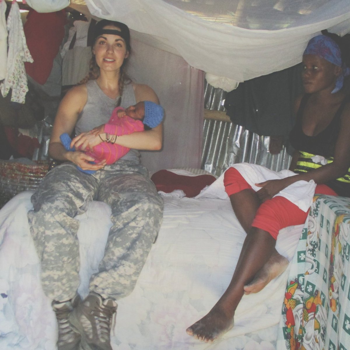 Elizabeth managing the small ones in a remote village hit hard by devastation in Haiti. 
Harprescue.org #Haiti #SAR #rescue #humanitarian #aid #savinglives #harprescue