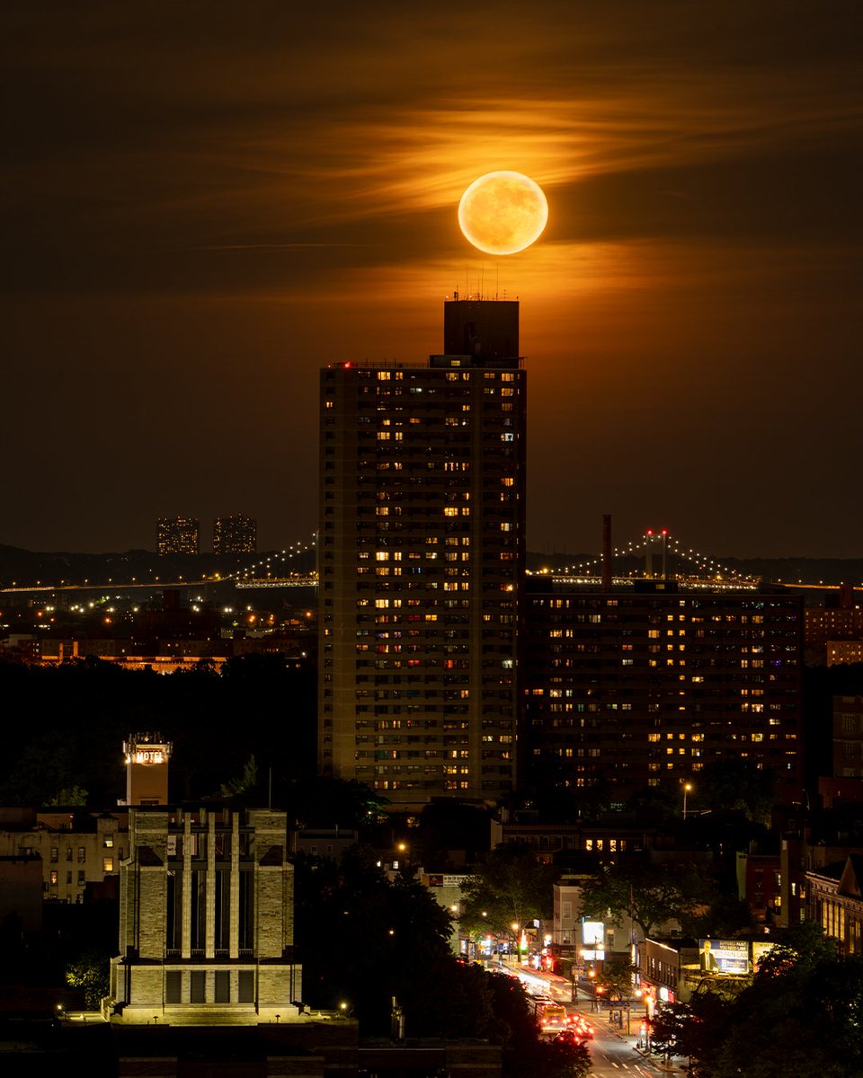 Inthebronxx's tweet photo. Strawberry Full Super Moon 🌕 

It's been some time since I photographed the Moon. So why not keep it fresh with tonight's Super Moon. As seen from Fordham Heights. 

📷 @sonyalpha A7RIV | ISO100 1/10sec F/9 200mm #sonyalpha #StrawberryMoon https://t.co/P6TirnL1vd