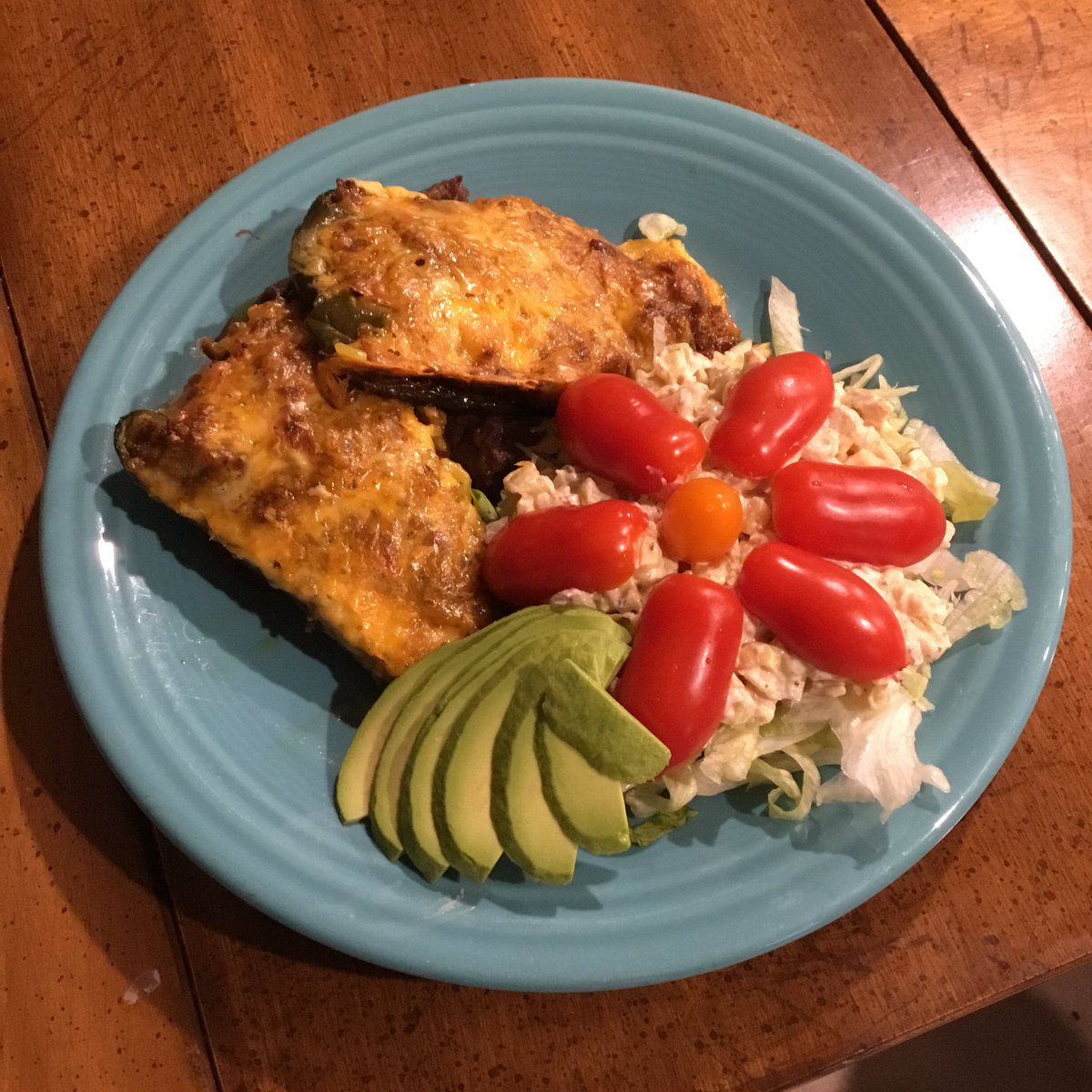 Last night we had an amazing #glutenfree southwestern meal. Poblano peppers stuffed with ground beef, yellow rice, &amp; Colby-Jack on black beans and served with a street corn salad and fresh veggies. Everyone LOVED it!  #celiac #TopChefJr #stuffedpeppers #stuffedpoblanos