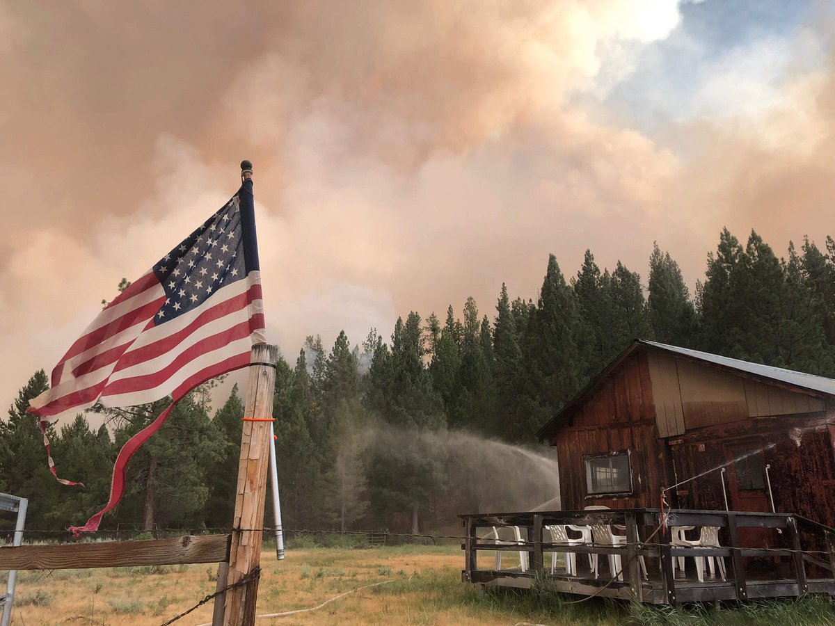 ElizabethMeadow's tweet photo. In honor of #flagday our cabin survived the #bootlegfire @KOBITV @MattJordanKOBI https://t.co/leZzv1BjYW