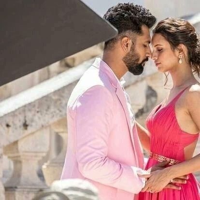 filmfare's tweet photo. Scorching BTS scenes from #VickyKaushal and #TriptiDimri's shoot in Croatia.  💕🔥 https://t.co/7pXMpviMRR