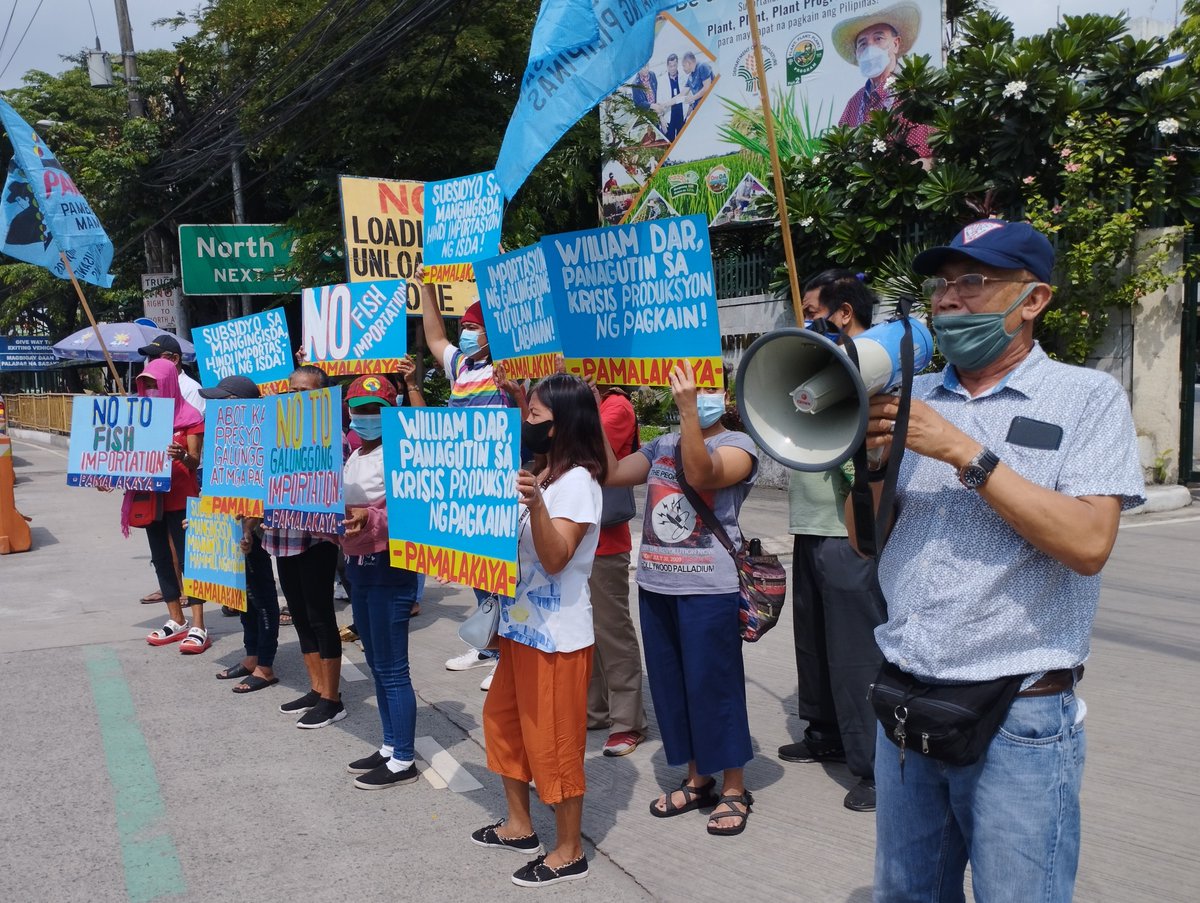 PCFSGlobal's tweet photo. As the #WTO closes its #MC12 today, Filipino fisherfolk group @pama_pil held a protest action in front of the Dept. of Agriculture in the #Philippines to oppose the importation of galunggong (round scad), one of the country’s fish staple.
#AFutureWithoutWTO
#PeoplesTradeAgenda https://t.co/iMs7E4lNxW