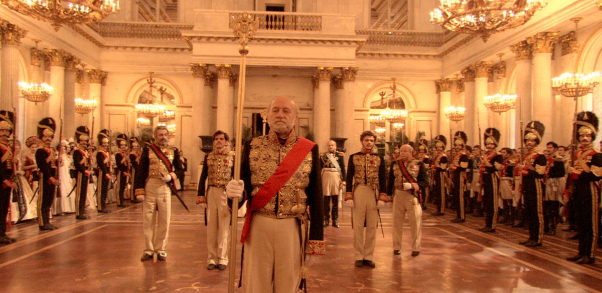 Russian Ark (2002) follows a ghost and his long-dead aristocrat companion through the Winter Palace in St. Petersburg, bouncing through several hundred years of shared history and culture. Innovative and beautiful; shot in a single take.