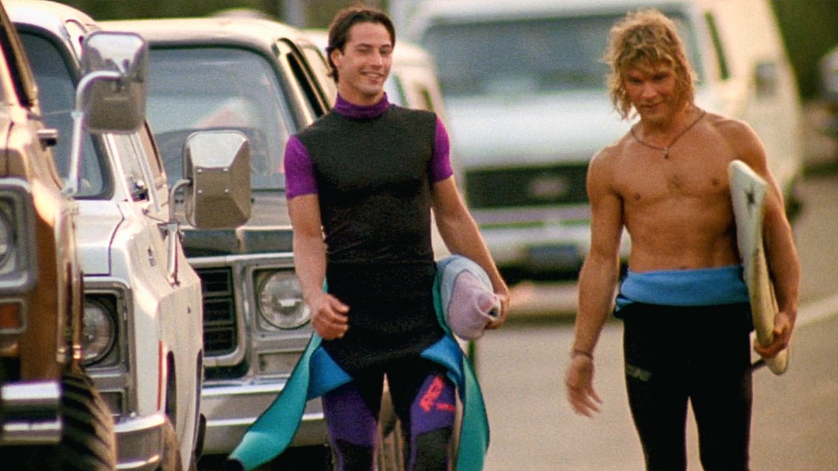 Point Break (1991) is a sprawling action epic about an FBI agent who goes undercover to hunt down a gang of surfers funding their free-spirited lifestyle through bank robbery.