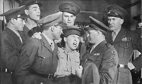 Hail the Conquering Hero (1944) is about a good-hearted dockworker unable to fight in WW2 due to hayfever, but too ashamed to go home. He is befriended by a squad of recently-returned Marines, whose scheme to return him to his family without losing face quickly snowballs.